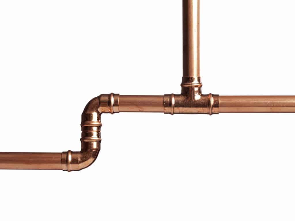 Copper Piping with white background.